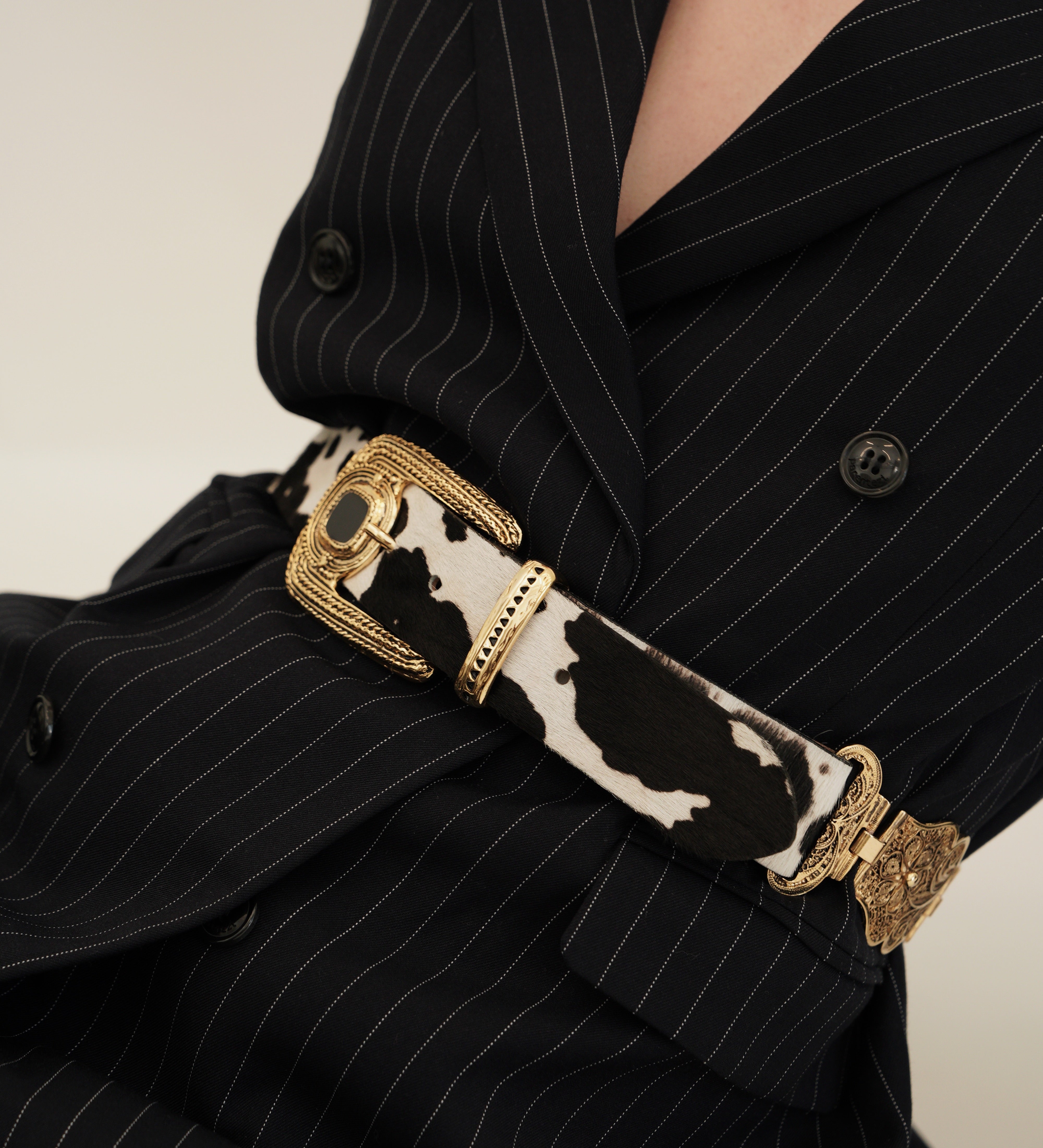 Streets Ahead Guilded Belt — cow-print leather belt with gold buckle, handcrafted in Los Angeles