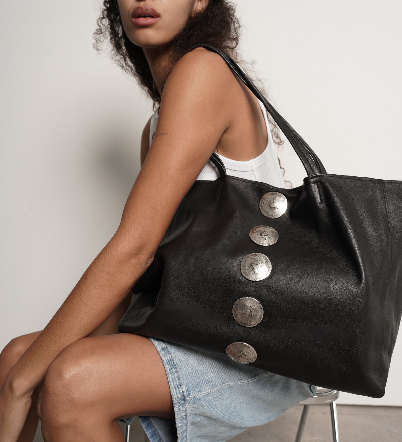 Gaia Tote in black Italian leather, side view, Streets Ahead