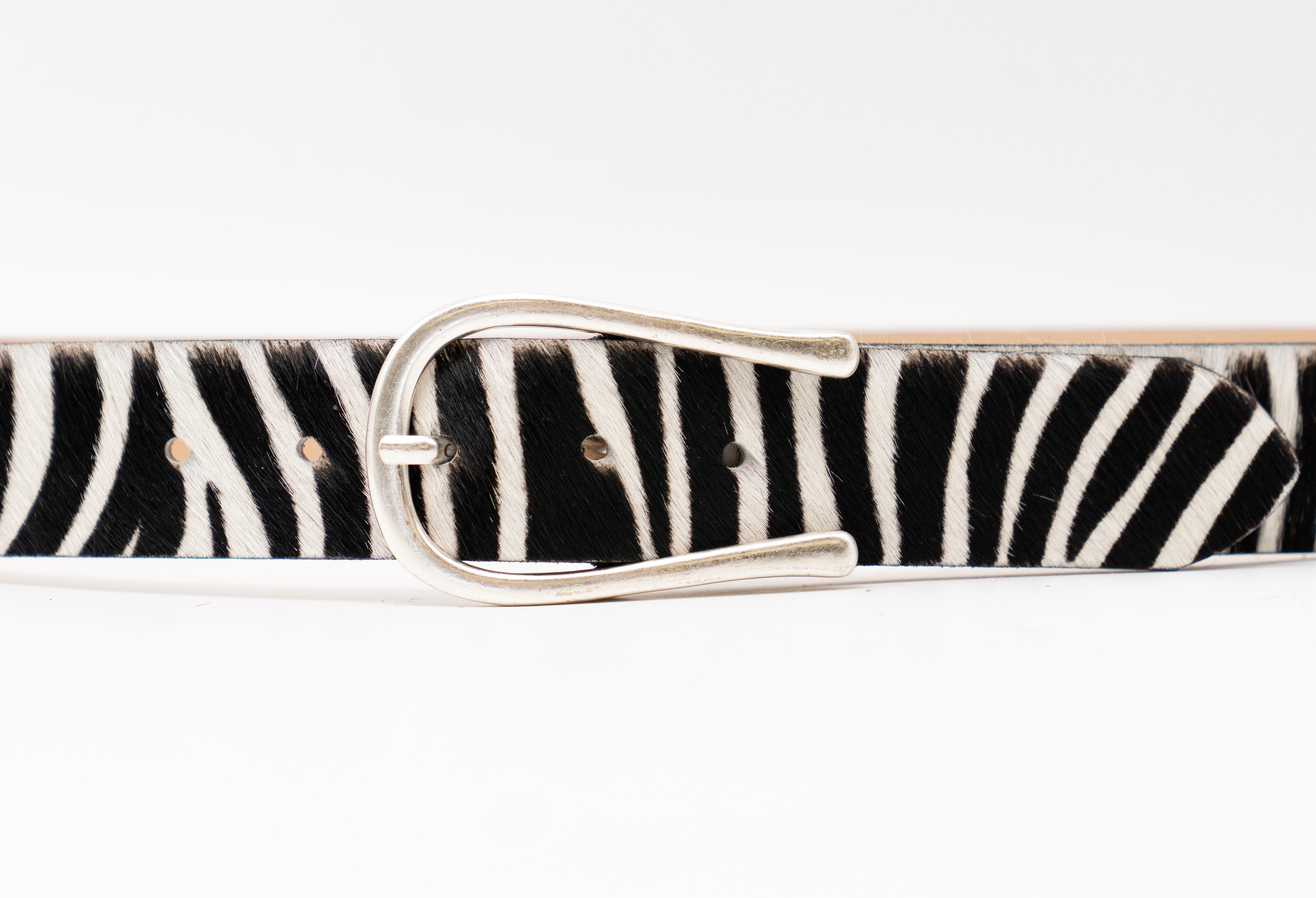 Close up zebra print calf hair belt with silver buckle - Streets Ahead