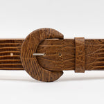 Tara Belt in lizard-embossed Italian calfskin with a covered buckle, handcrafted in Los Angeles.