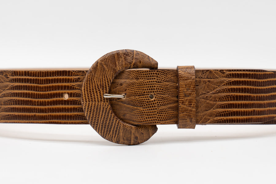 Tara Belt in lizard-embossed Italian calfskin with a covered buckle, handcrafted in Los Angeles.