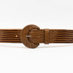Tara Belt in lizard-embossed Italian calfskin with a covered buckle, handcrafted in Los Angeles.