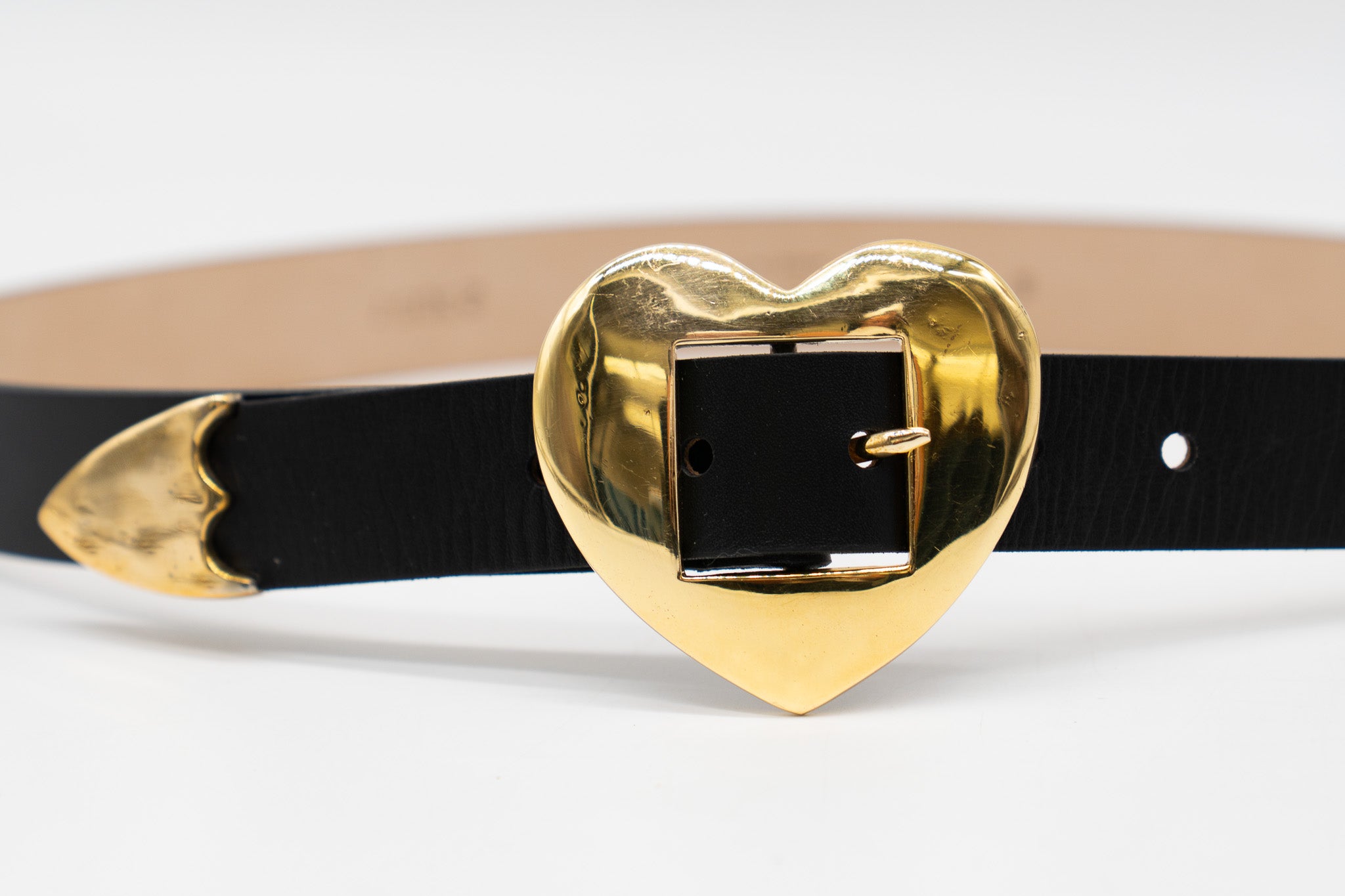 Streets Ahead Brass Hammered Heart Belt — black leather with brass heart hardware, handcrafted in Los Angeles