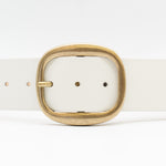 White Italian leather belt with brass-plated buckle, handcrafted in Los Angeles using custom hardware