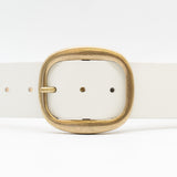 White Italian leather belt with brass-plated buckle, handcrafted in Los Angeles using custom hardware
