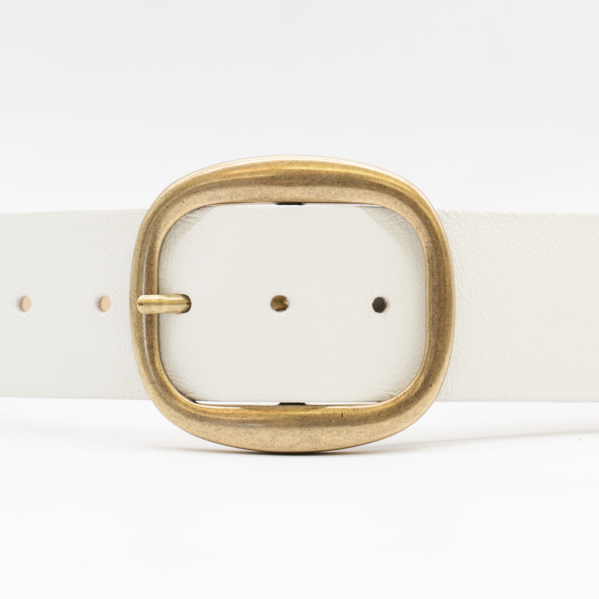 White Italian leather belt with brass-plated buckle, handcrafted in Los Angeles using custom hardware