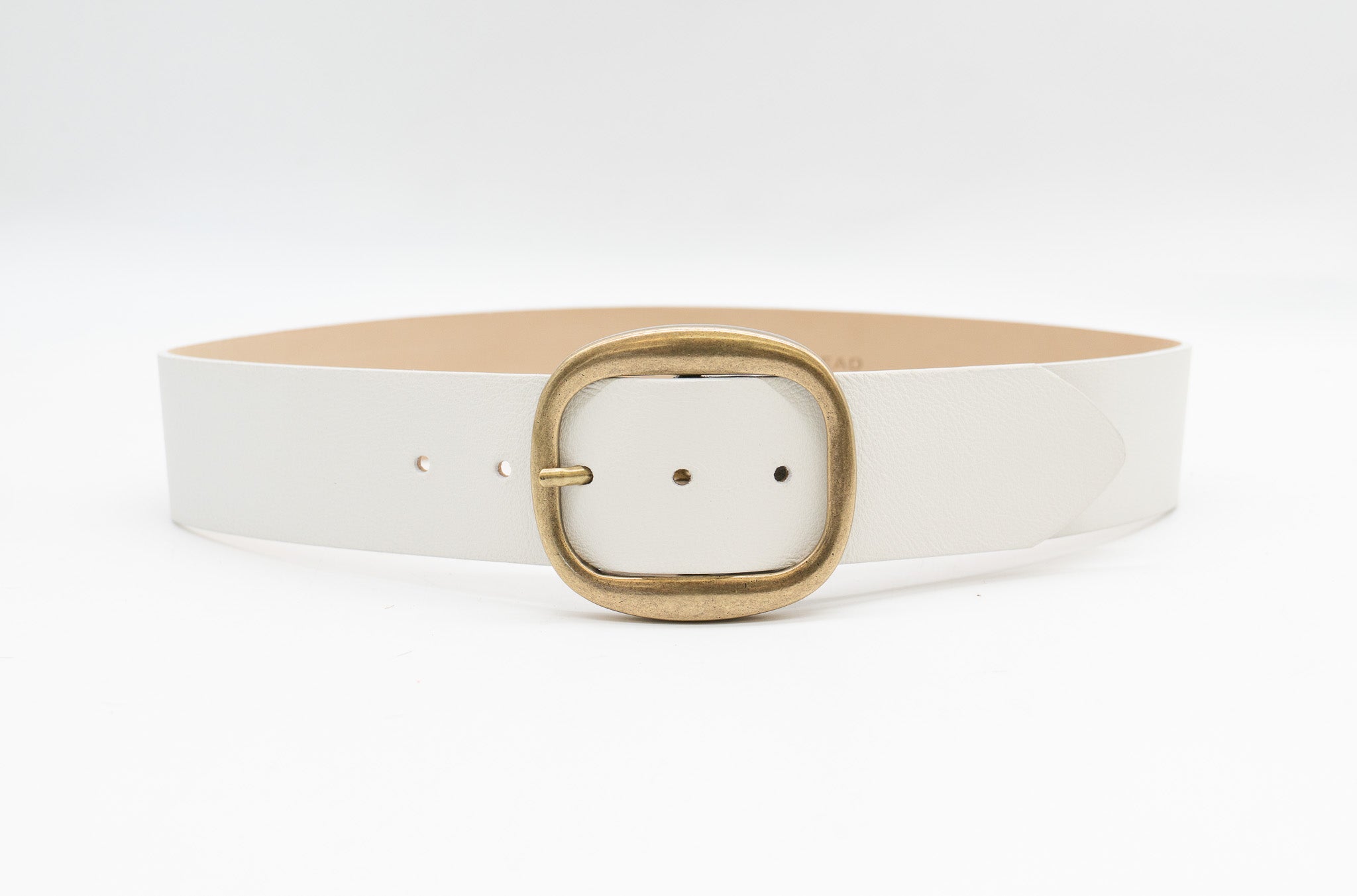 White Italian leather belt with brass-plated buckle, handcrafted in Los Angeles using custom hardware