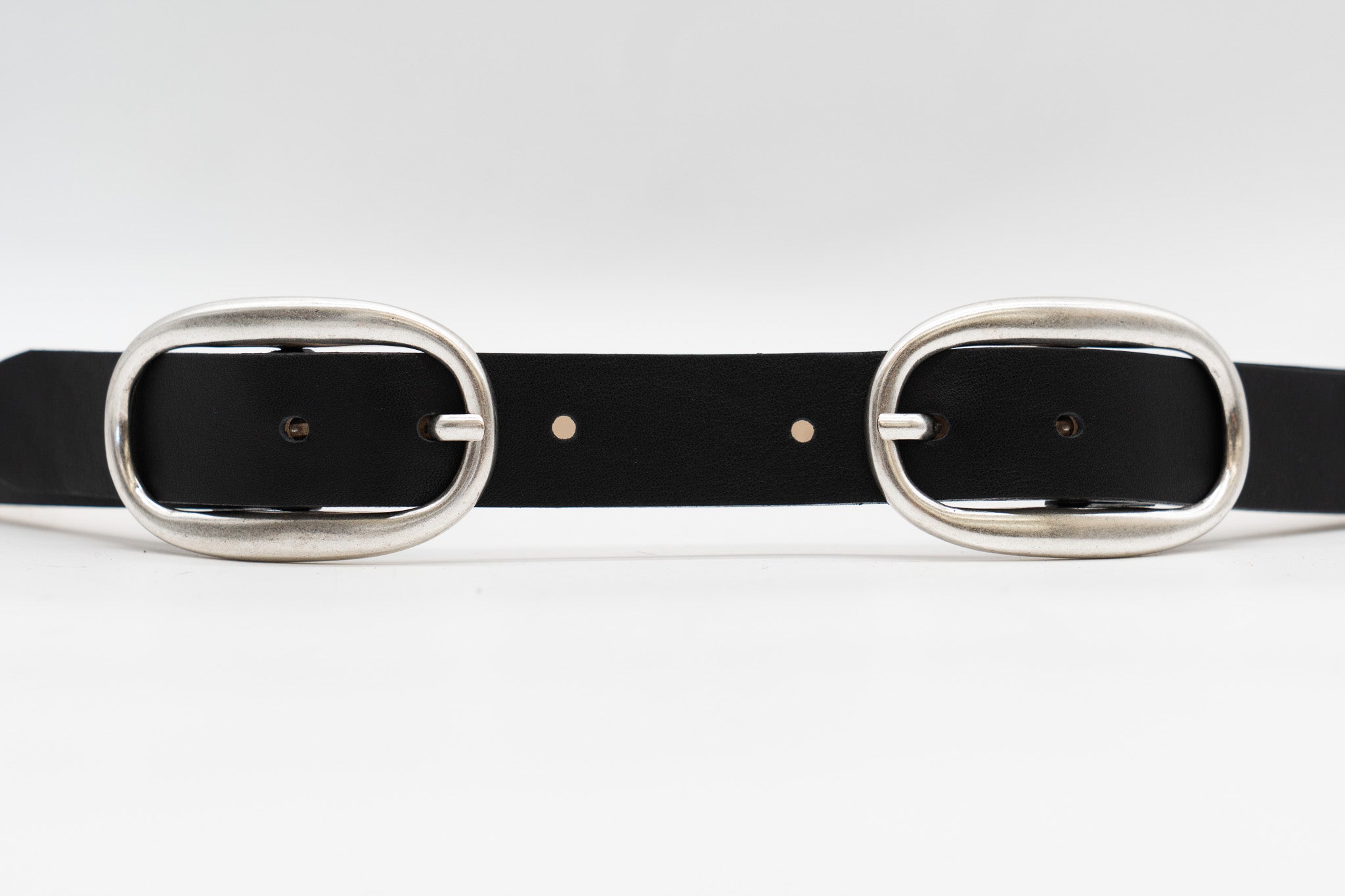 Black Italian leather belt with dual silver-plated buckles, handcrafted in Los Angeles using custom hardware