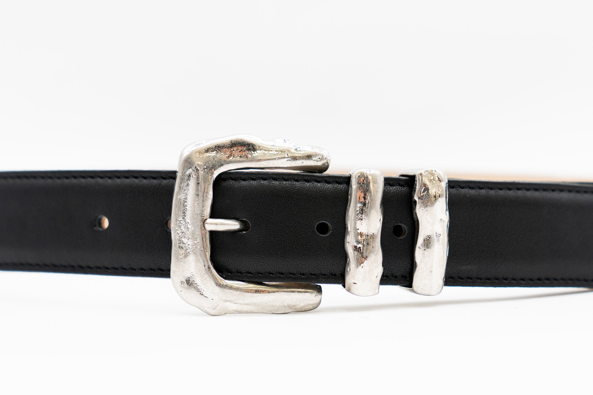 Black Italian leather belt with sculptural silver-plated buckle and keeper set, handcrafted in Los Angeles using custom hardware
