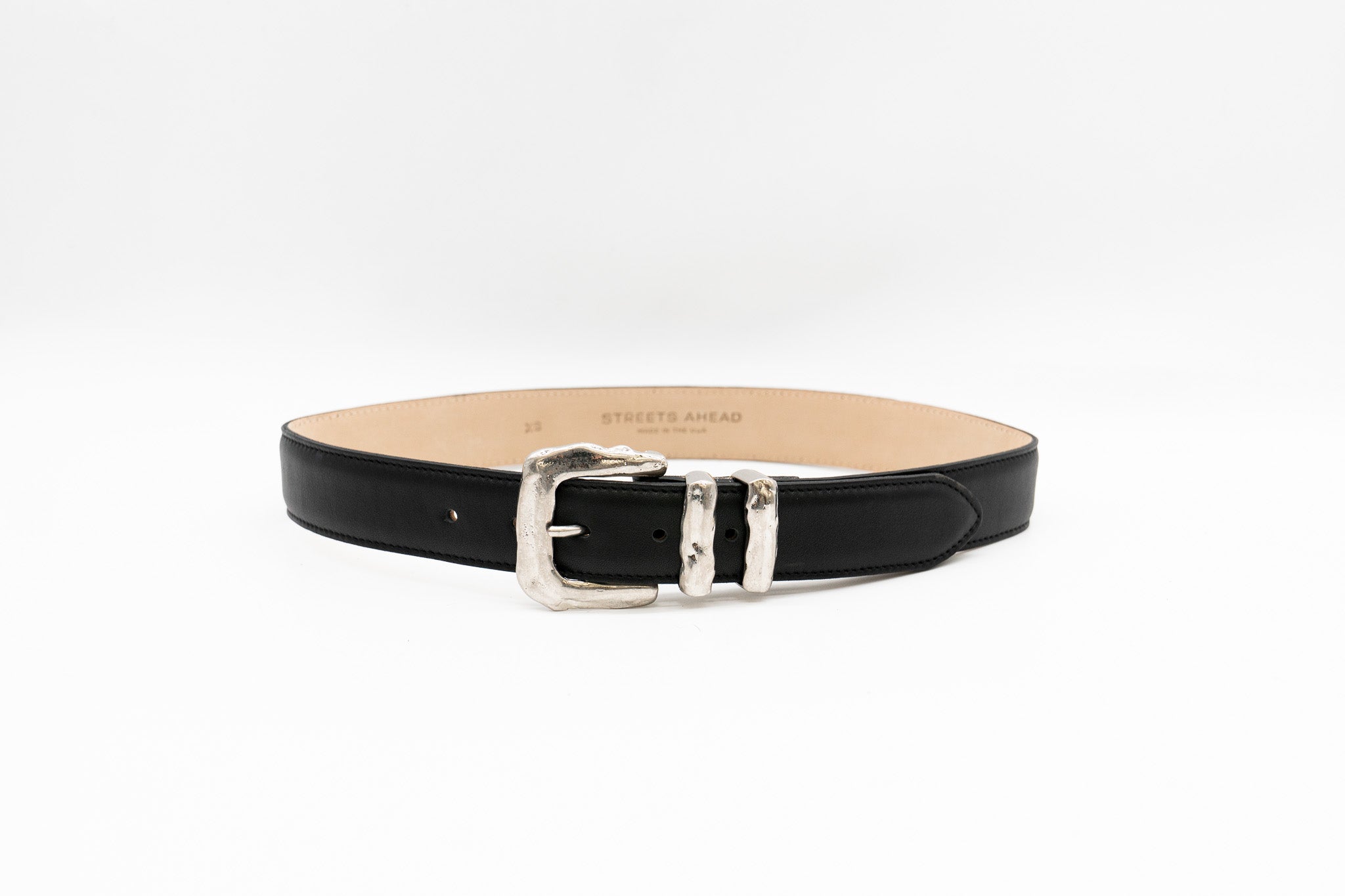 Black Italian leather belt with sculptural silver-plated buckle and keeper set, handcrafted in Los Angeles using custom hardware