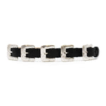 Black Italian leather belt with sculptural silver-plated multi-buckle detailing, handcrafted in Los Angeles using custom hardware