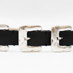 Black Italian leather belt with sculptural silver-plated multi-buckle detailing, handcrafted in Los Angeles using custom hardware