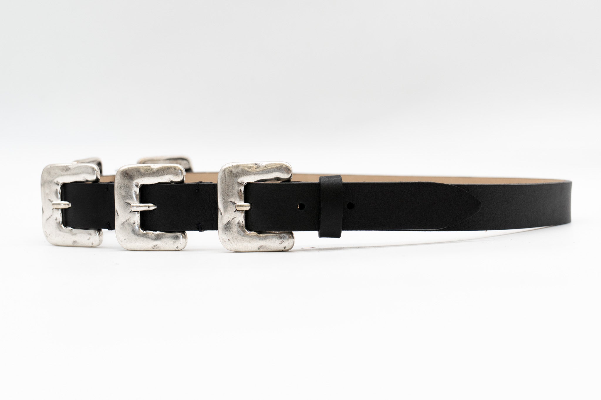 Black Italian leather belt with sculptural silver-plated multi-buckle detailing, handcrafted in Los Angeles using custom hardware