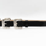 Black Italian leather belt with sculptural silver-plated multi-buckle detailing, handcrafted in Los Angeles using custom hardware
