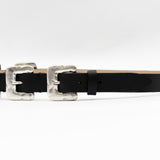 Black Italian leather belt with sculptural silver-plated multi-buckle detailing, handcrafted in Los Angeles using custom hardware