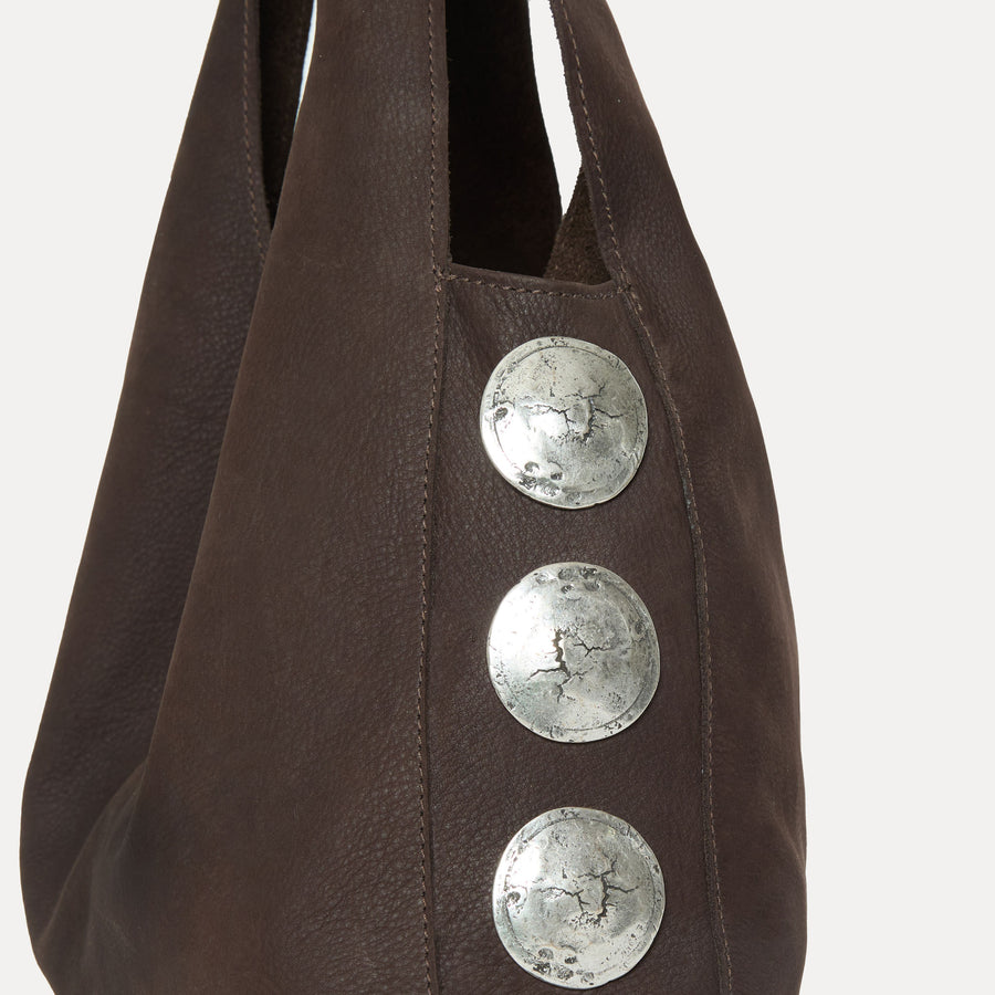 Close-up of silver Italian hardware on the Rhea Slouchy Hobo in coffee leather - Streets Ahead