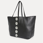 Angled view of the Gaia Slouchy Tote in black leather showing soft, unstructured silhouette.