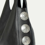 Close-up of silver Italian hardware on the Rhea Slouchy Hobo in black leather - Streets Ahead