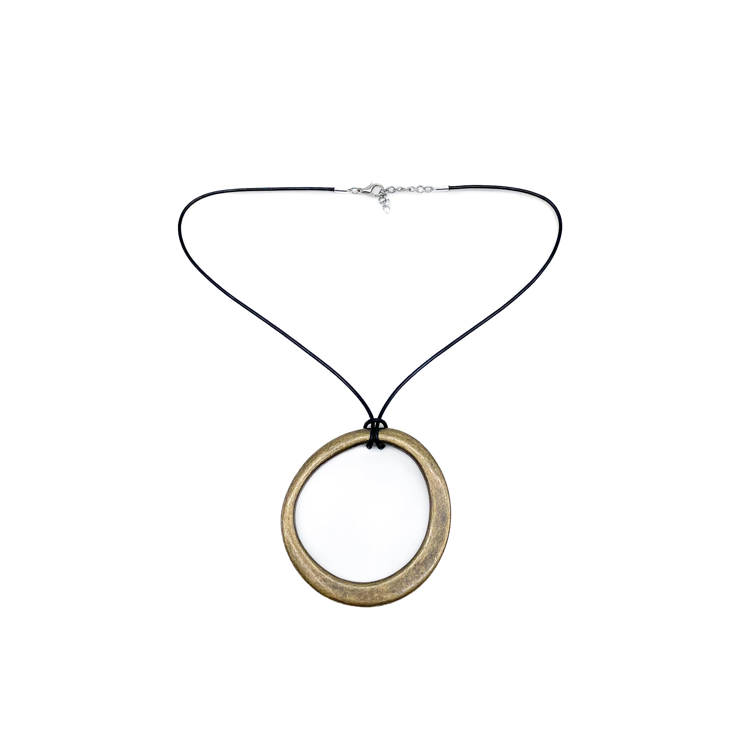 Calista Necklace Brass with black cord and brass circular pendant, Streets Ahead