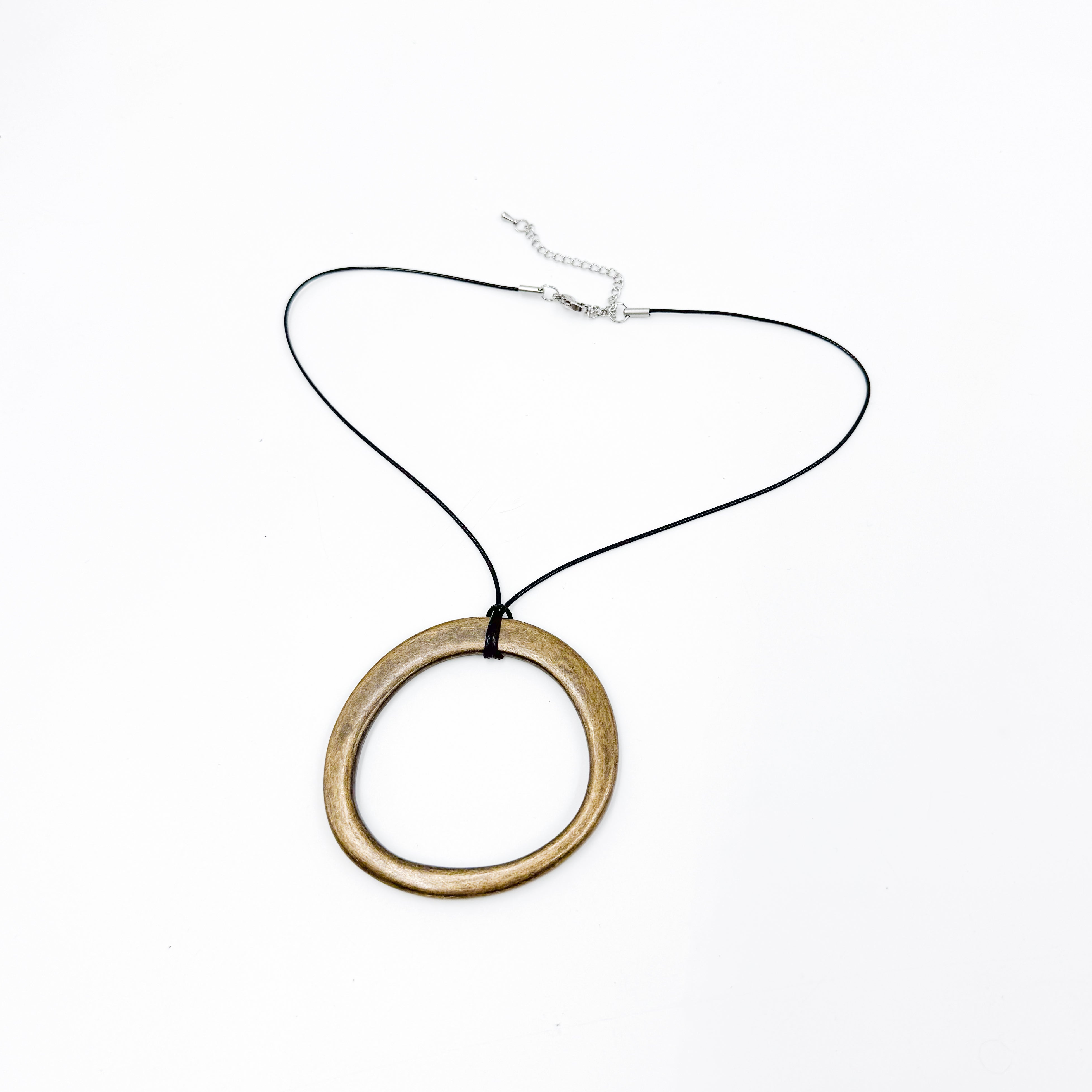 Streets Ahead Calista Necklace Brass — black cord with brass pendant, handcrafted in Los Angeles