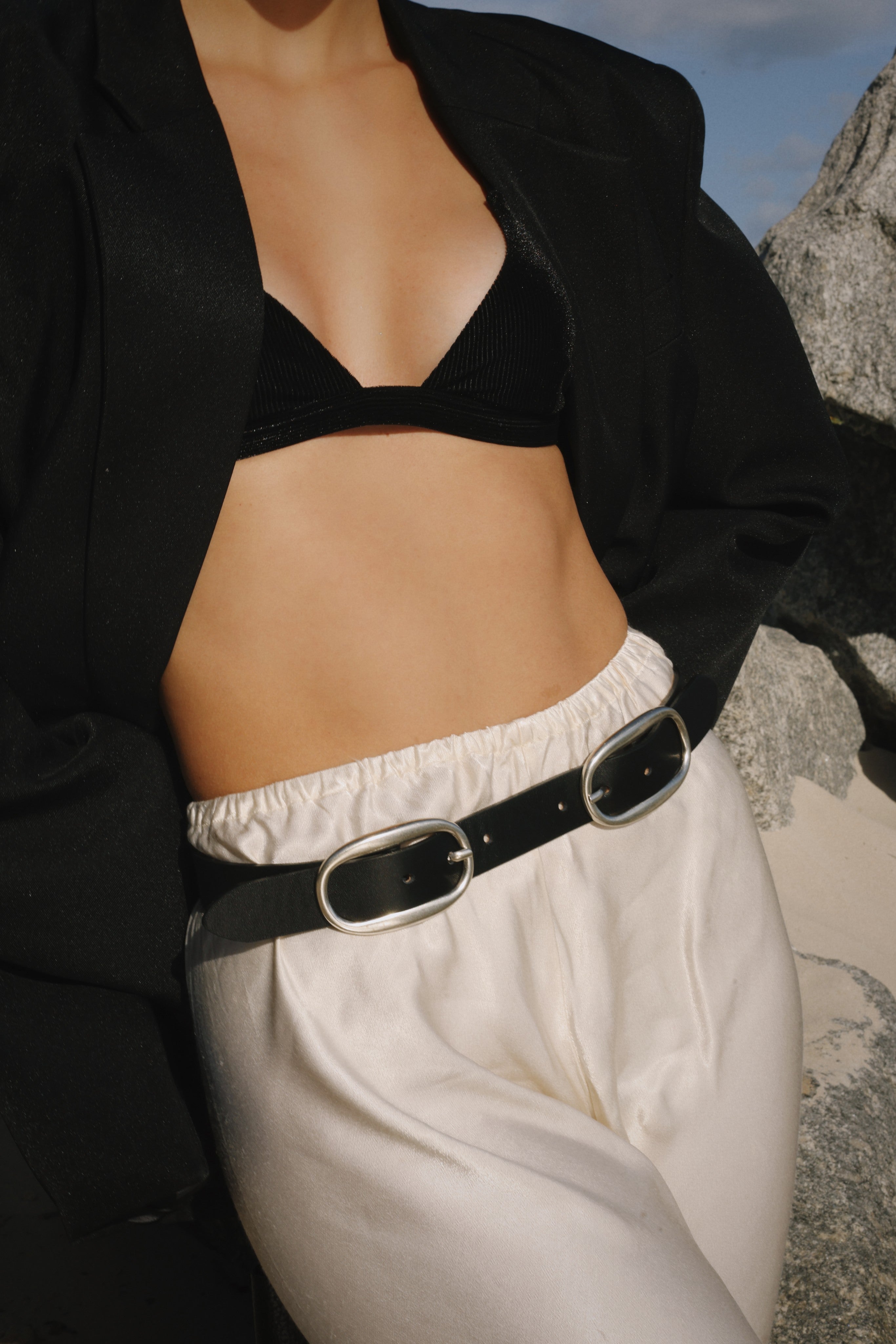 Black Italian leather belt with dual silver-plated buckles, handcrafted in Los Angeles using custom hardware