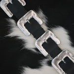Black Italian leather belt with sculptural silver-plated multi-buckle detailing, handcrafted in Los Angeles using custom hardware