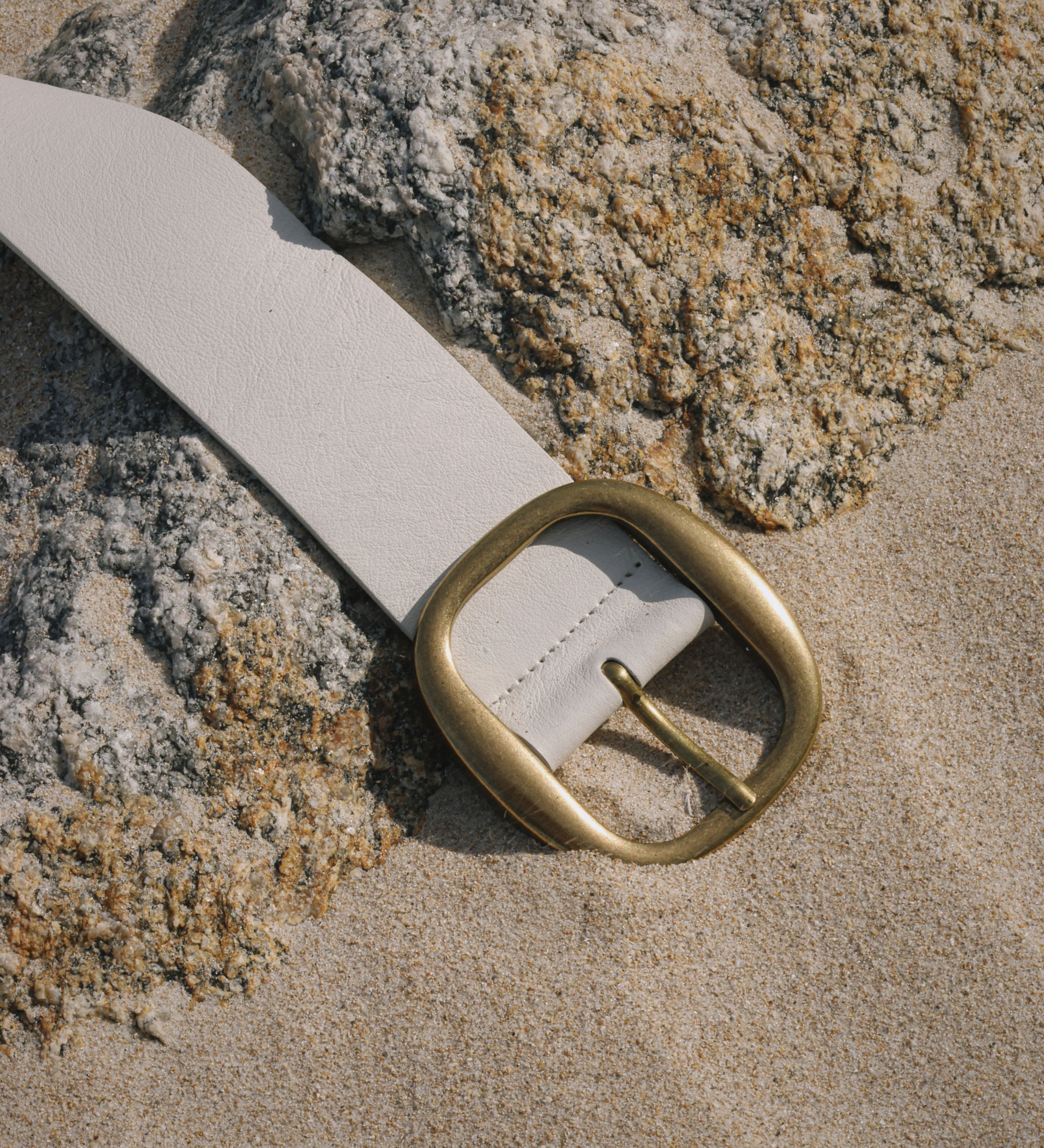 Streets Ahead Noa Belt — wide off-white leather with rounded brass-plated buckle