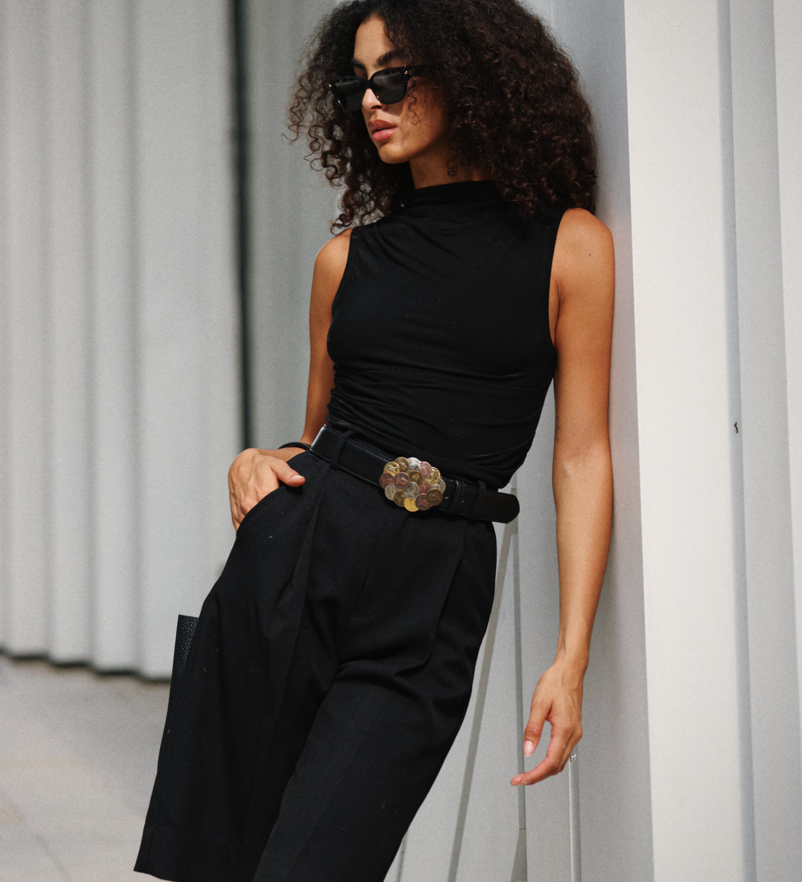 Streets Ahead Medici Belt — mixed-metal coin buckle on black Italian leather