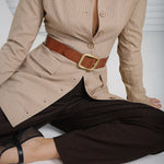 Side close-up of gold buckle detail on Natalia Belt in tan leather.