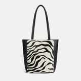 Mini Mara shopper in black and white zebra calf hair with matching zip pouch