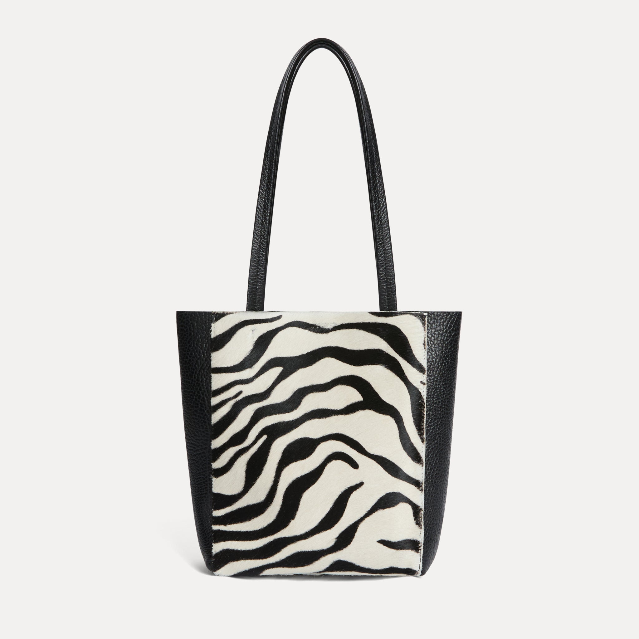 Mini Mara shopper in black and white zebra calf hair with matching zip pouch