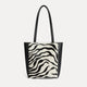 Mini Mara shopper in black and white zebra calf hair with matching zip pouch