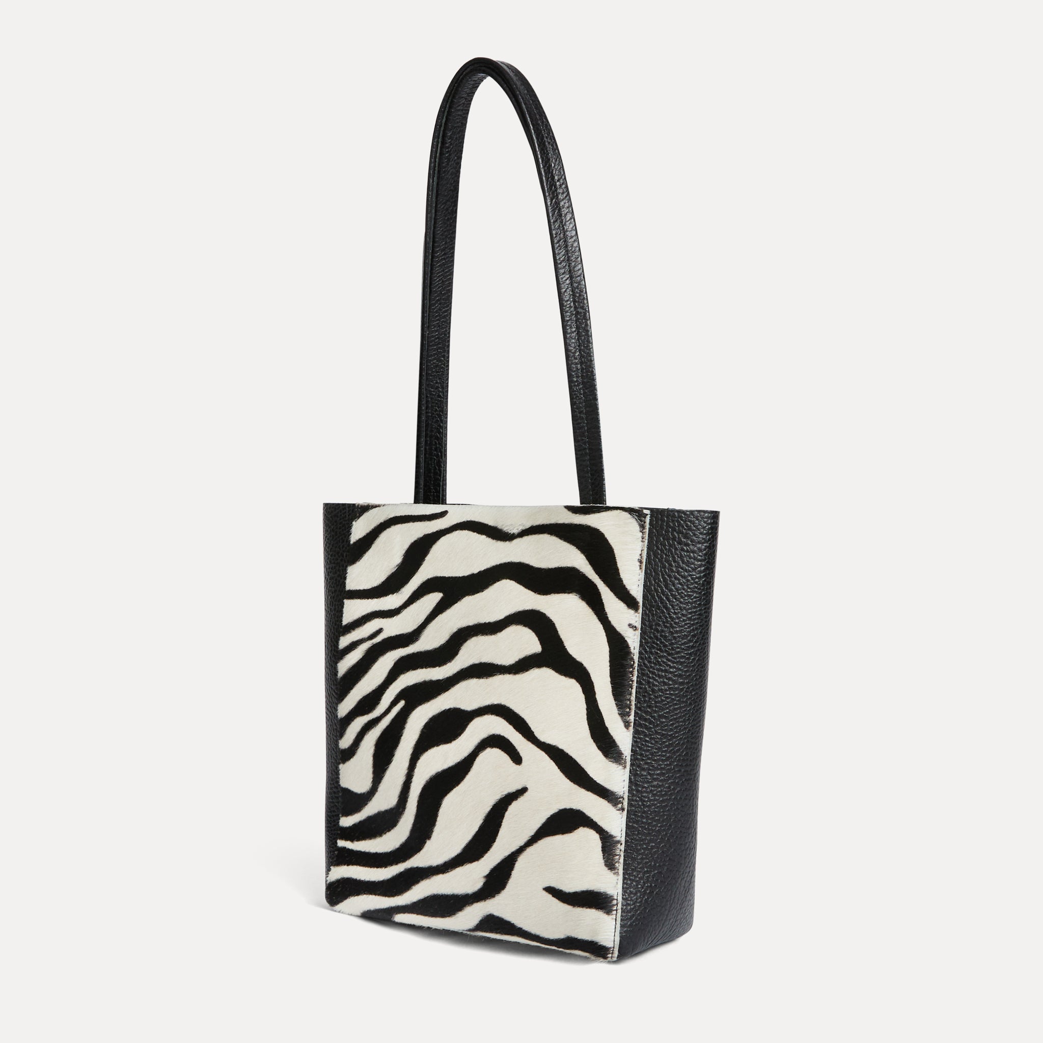 Mini Mara shopper in black and white zebra calf hair with matching zip pouch