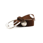 Harriet Belt in chocolate suede, coiled angle