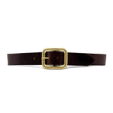 Natalia Belt in black Italian leather with 24k light gold-plated buckle, flat lay view - Streets Ahead